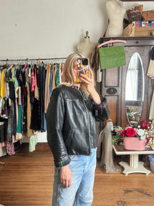 vintage 1960s black leather biker jacket