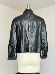 vintage 1960s black leather biker jacket